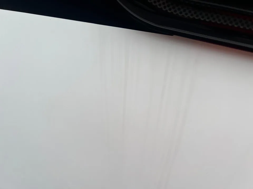 Removing black streak marks from a caravan exterior